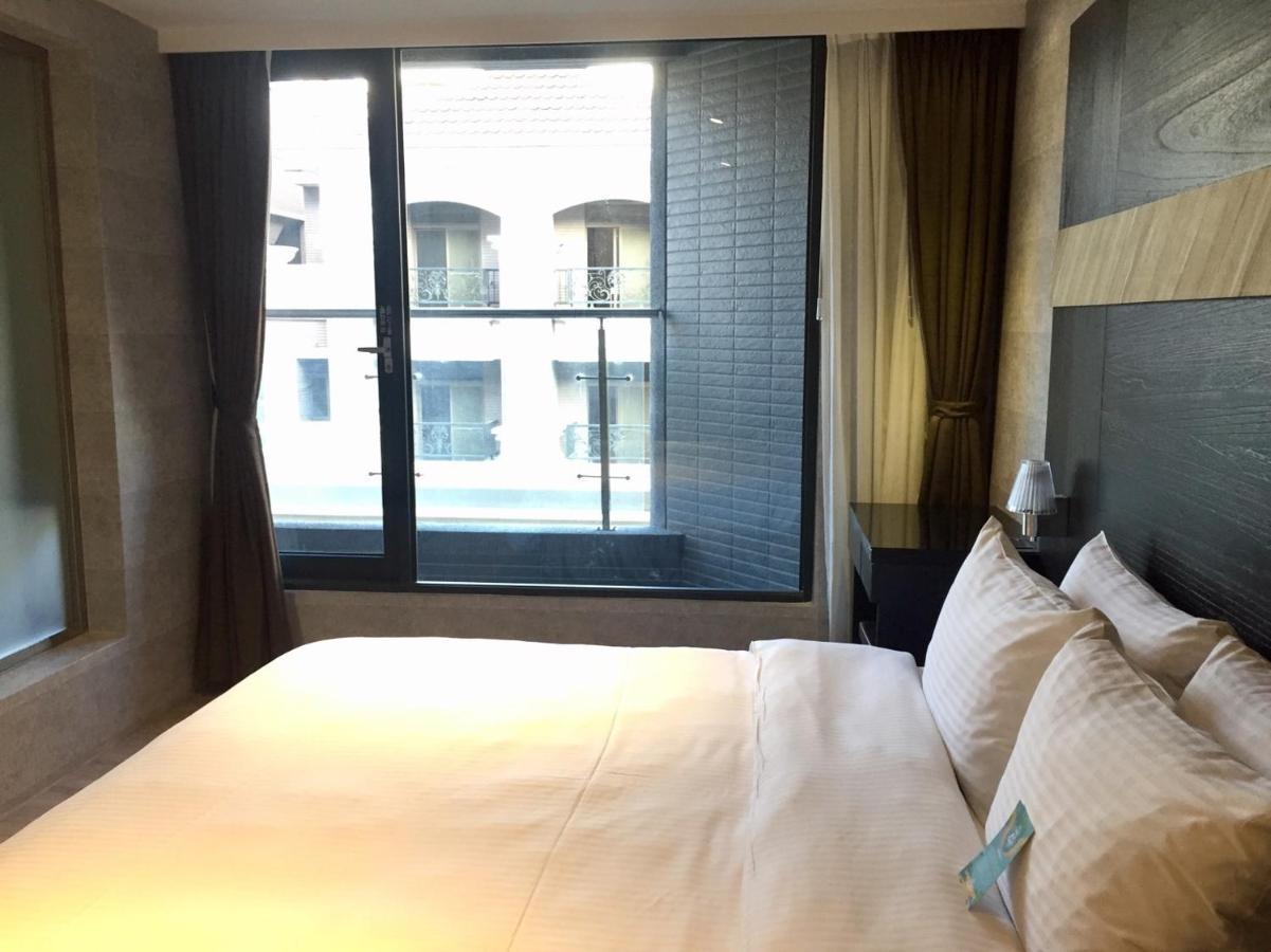 Fengjia Hotel Bell Тайчжун Экстерьер фото