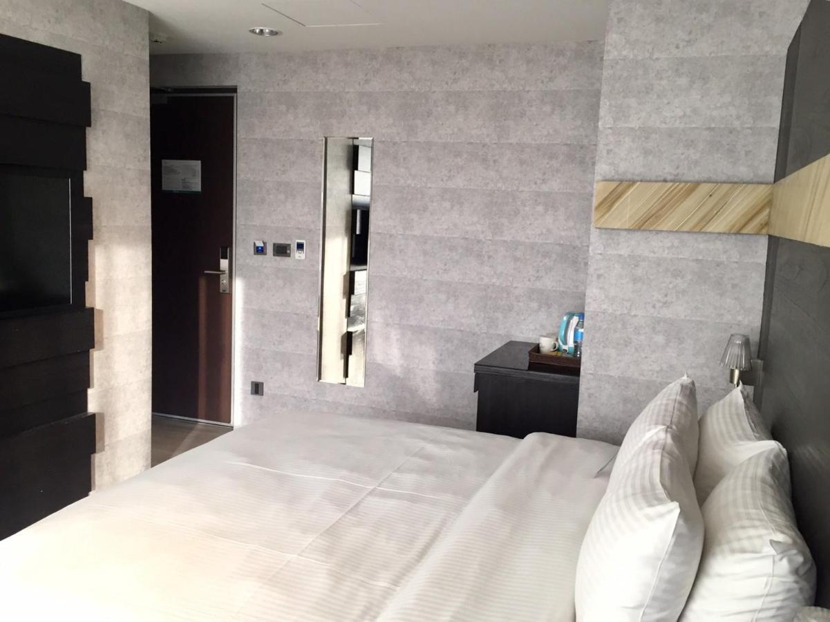 Fengjia Hotel Bell Тайчжун Экстерьер фото