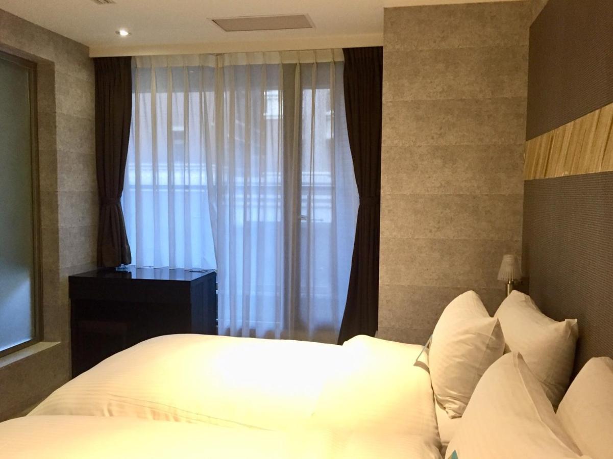 Fengjia Hotel Bell Тайчжун Экстерьер фото