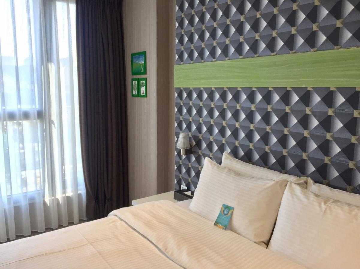 Fengjia Hotel Bell Тайчжун Экстерьер фото