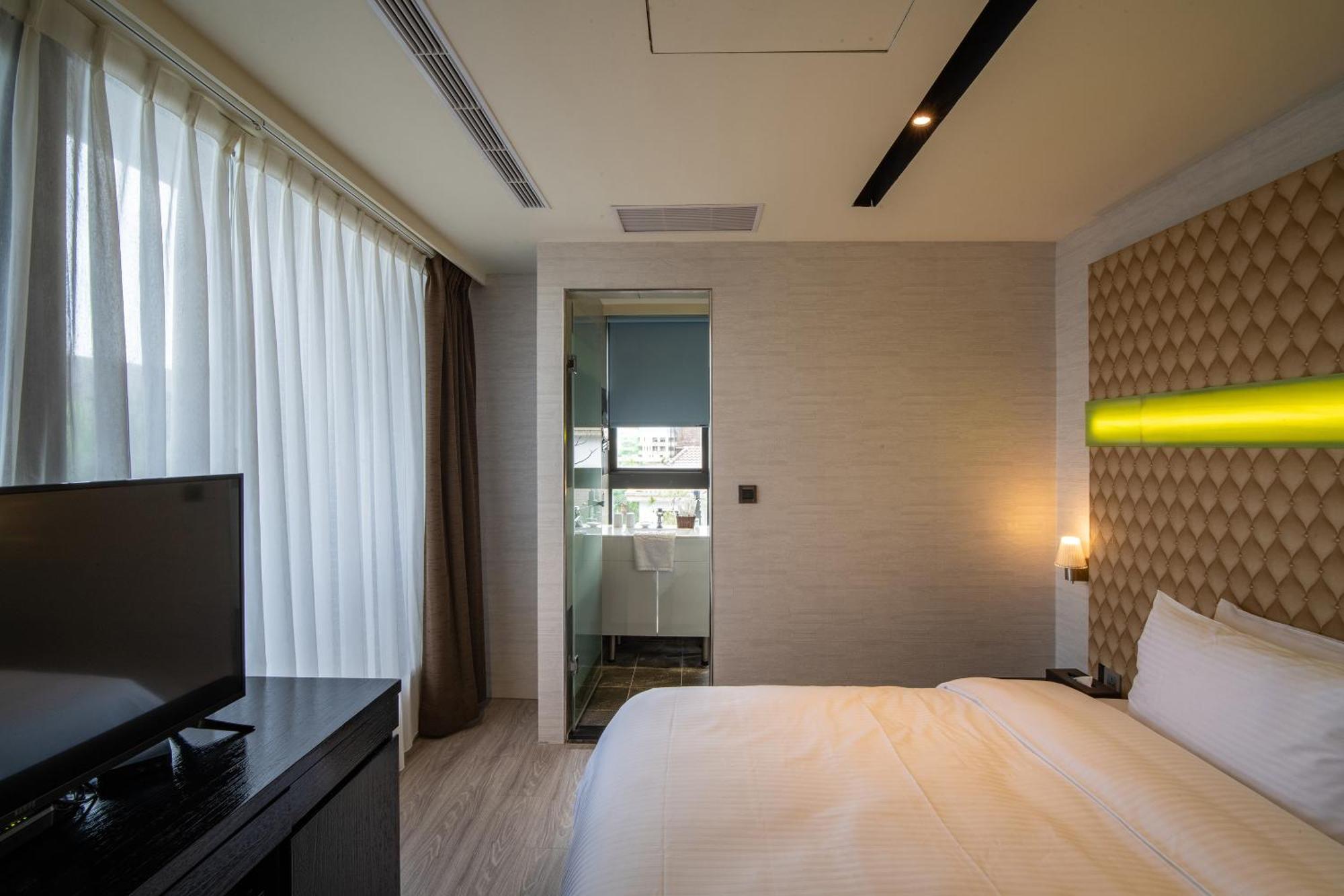 Fengjia Hotel Bell Тайчжун Экстерьер фото